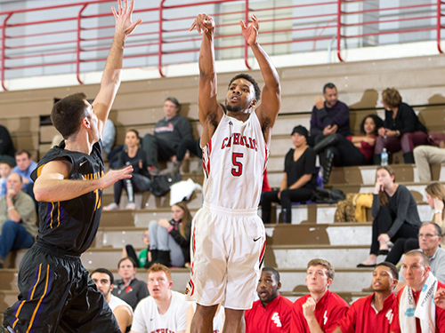Bryson Fonville shoots one of his 4 made 3-pointers in the win over Susquehanna. Courtesy of cuacardinals.com