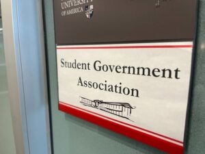 A sign next to a door reading "Student Government Association"